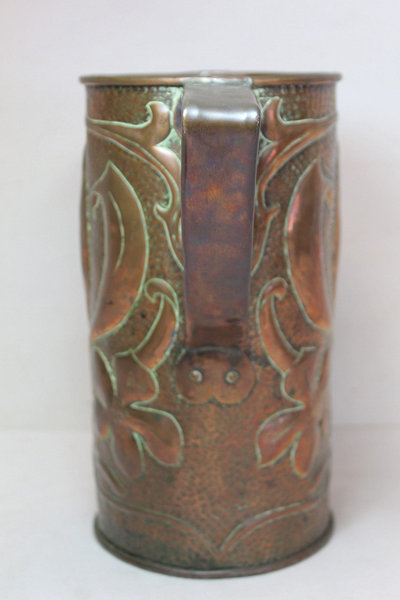 Arts & Crafts copper vase of twin handled cylindrical form, possibly Fivemiletown, with floral and - Image 3 of 9