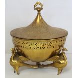 Indian brass censer of circular form on three peacock supports, with pierced floral decoration and