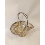 Silver cake basket of pinched shape with beaded handle by Fenton brothers, Sheffield 1911, 9oz /