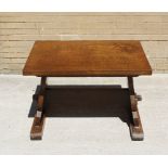 Irish oak trestle table of utilitarian form raised on squared base 76cm high, 106cm wide 67.5cm deep