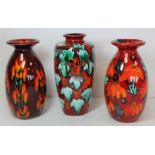 Three Anita Harris Studio Pottery vases, two of ovoid form with flared rims, the other of baluster