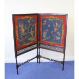 Georgian mahogany folding screen in the Chinese manner, the carved frame with needlework panels