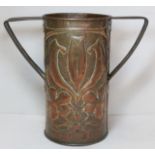 Arts & Crafts copper vase of twin handled cylindrical form, possibly Fivemiletown, with floral and