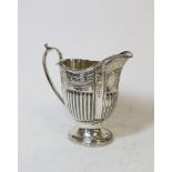 Silver cream jug of quatrefoil oval shape by Walker & Hall, Sheffield 1898, 4oz / 125g.