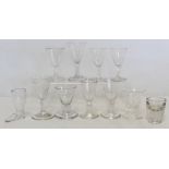 Collection of various antique drinking and other glasses, some with folded foot rims, the largest