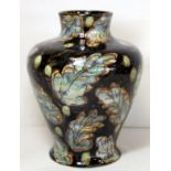Anita Harris Cobridge Stoneware "Nightfall" pattern vase of baluster form decorated with oak leaves,