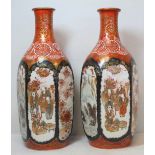 Pair of finely painted Japanese Meiji period Kutani vases of hexagonal bottle form with pictorial