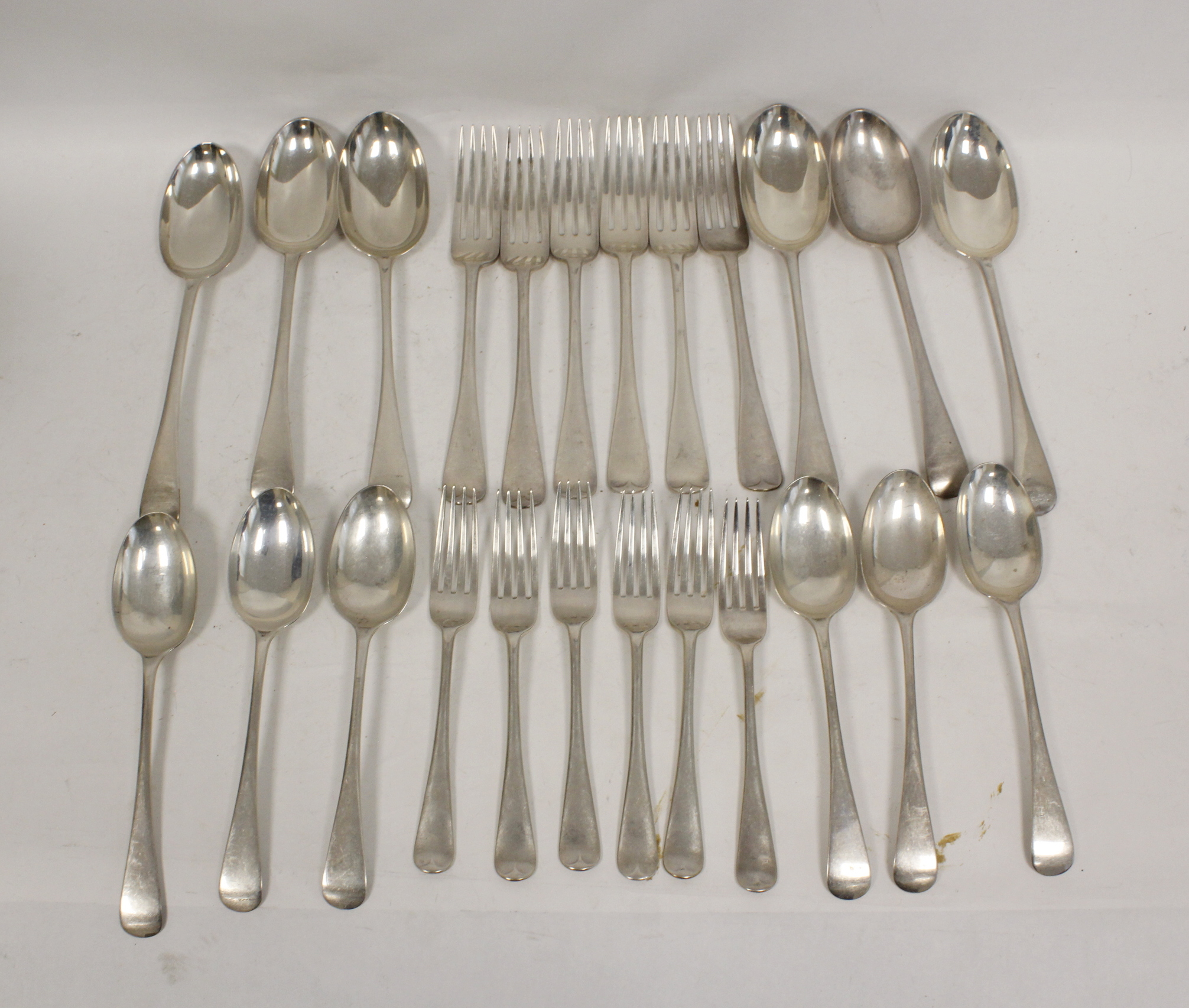Silver table service of plain 'Old English' pattern comprising six each of table and dessert
