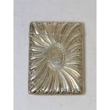 Silver card case with radiating embossing by W. Comyns 1899, 138g.