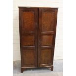 19th century mahogany cupboard, a pair of panel doors opening to reveal an arrangement of twenty