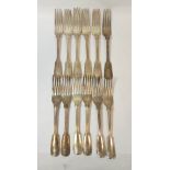 Set of twelve silver table forks, fiddle and thread, crested, by George Adams 1874, 1094g.