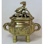 Oriental brass censer of lobed quatrefoil form with two moulded panels of deer and bird amongst