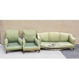 Pair of Howard style armchairs on square tapered supports and castors and a similar sofa (In need of