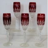 Set of five Waterford Crystal ruby flashed "Clarendon" champagne flutes, each 25.5cm high.  (5).