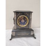 French mantel clock in inlaid and incised black Namur marble case with mask and drop handles, 28cm.