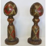Pair of antique Kashmiri painted wooden decorative rail posts of knopped form decorated in red,