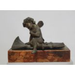 19th century metal figure of a pixie reading a letter, after an original by Ernest Justin Ferrand (