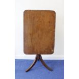 Regency inlaid mahogany occasional table the rounded rectangular top on turned column and