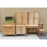 Heal's of London: eight pieces of limed oak bedroom furniture comprising, two wardrobes, one with