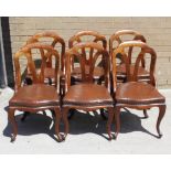 Set of six Victorian dining chairs with triple scroll arch pierced backs, upholstered seats and