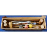 Vintage Atlas croquet set contained in wooden box, comprising: four mallets; four balls; six