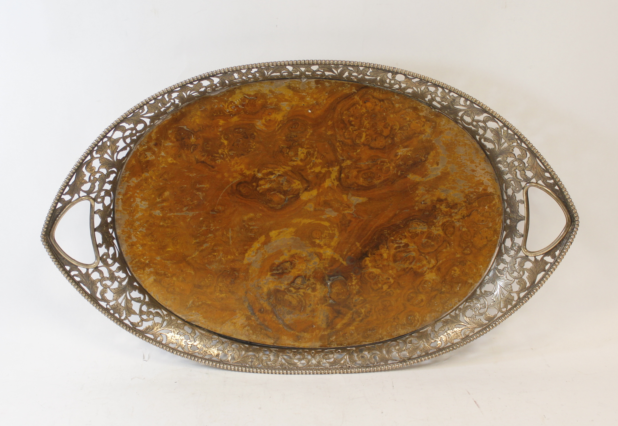 Dutch burr walnut oval tray with pierced and engraved silver gallery, Import Marks, 1908, 50cm.