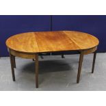 19th century mahogany extending dining table raised on tapered reeded supports. 75cm high, 115cm