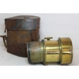 Victorian brass portrait camera lens by Andrew Ross of London, no. 2924, 4½" diam., contained in