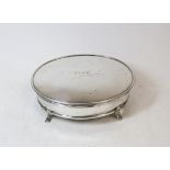 Silver oval bijouterie box, initialled, on spreading feet, Sheffield 1928, 16cm.