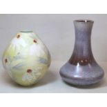 Cobridge Stoneware vase of ovoid form designed by Anita Harris, decorated with white flowers on a