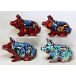 Four Anita Harris and Samantha Johnson studio pottery figures of pigs with abstract polychrome