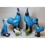 Pair of 20th century Chinese porcelain figures of cockerels with turquoise and manganese glazes,