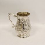 Silver embossed mug of Georgian style, inscribed by Walker & Hall, Sheffield 1900, 343g / 11oz.