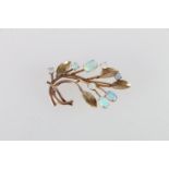 14ct gold floral spray brooch set with opals, applied "14K" lozenge, 4.5g, 4cm long