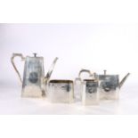 Victorian four piece silver tea set of tapering rectangular form with canted corners and engraved