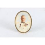Portrait miniature on ivory depicting a WWII served officer wearing white shirt with RAF brevet,