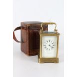 French carriage clock by Mackay and Chisholm, the white enamel dial with Roman numeral chapters,