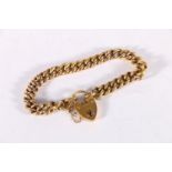 9ct gold curb link bracelet with 9ct gold heart shaped padlock clasp, 16.4