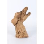 A Japanese rootwood carving of an elderly figure, probably Fukurokuju, the figure slightly bent