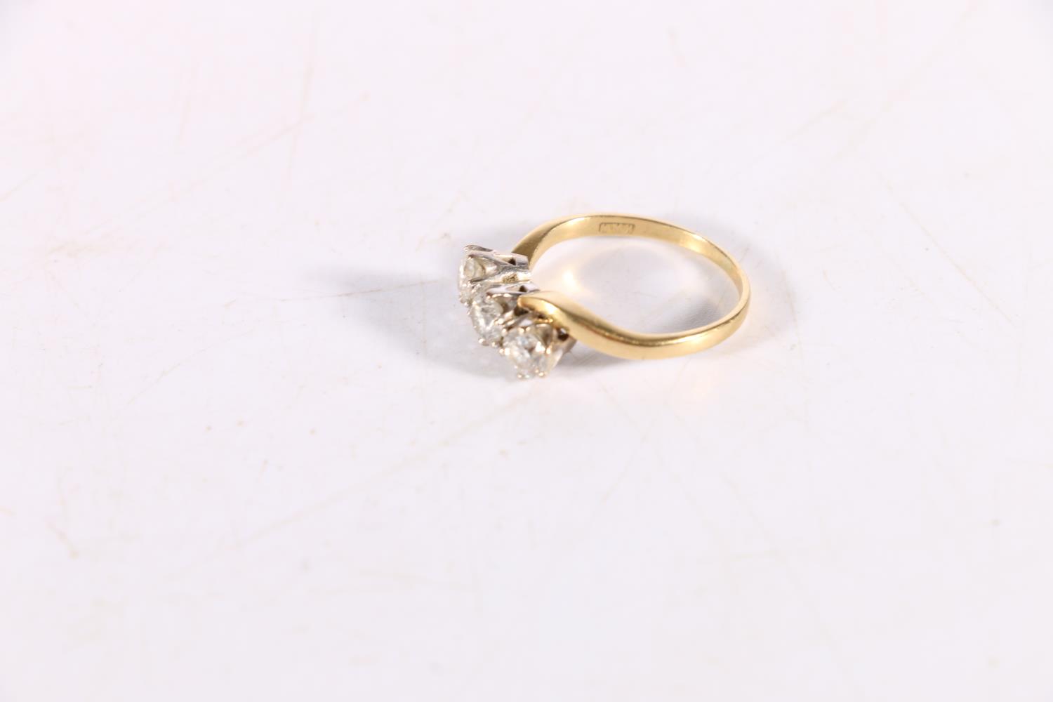 18ct yellow gold diamond three stone ring, the three diamonds arranged in a crossover setting, - Image 2 of 3