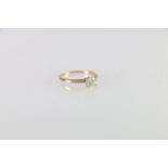 14ct gold diamond solitaire ring, the central round diamond approximately 0.7cts, ring size M, 1.8g