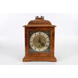 Astral Coventry walnut cased bracket or mantle clock, the dial with Roman numeral chapter ring, 35cm