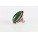 Georg Jensen of Denmark Sterling silver ring set with oval cabochon green stone, after Harald