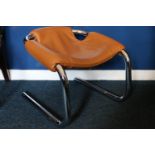 Arkana 1970's retro sling chair comprising of a bent shaped chrome plated tubular frame with a tan