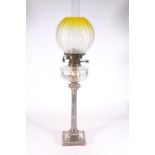 Silver plated Corinthian column paraffin lamp by HE&Co (Hawksworth, Eyre & Co), with glass