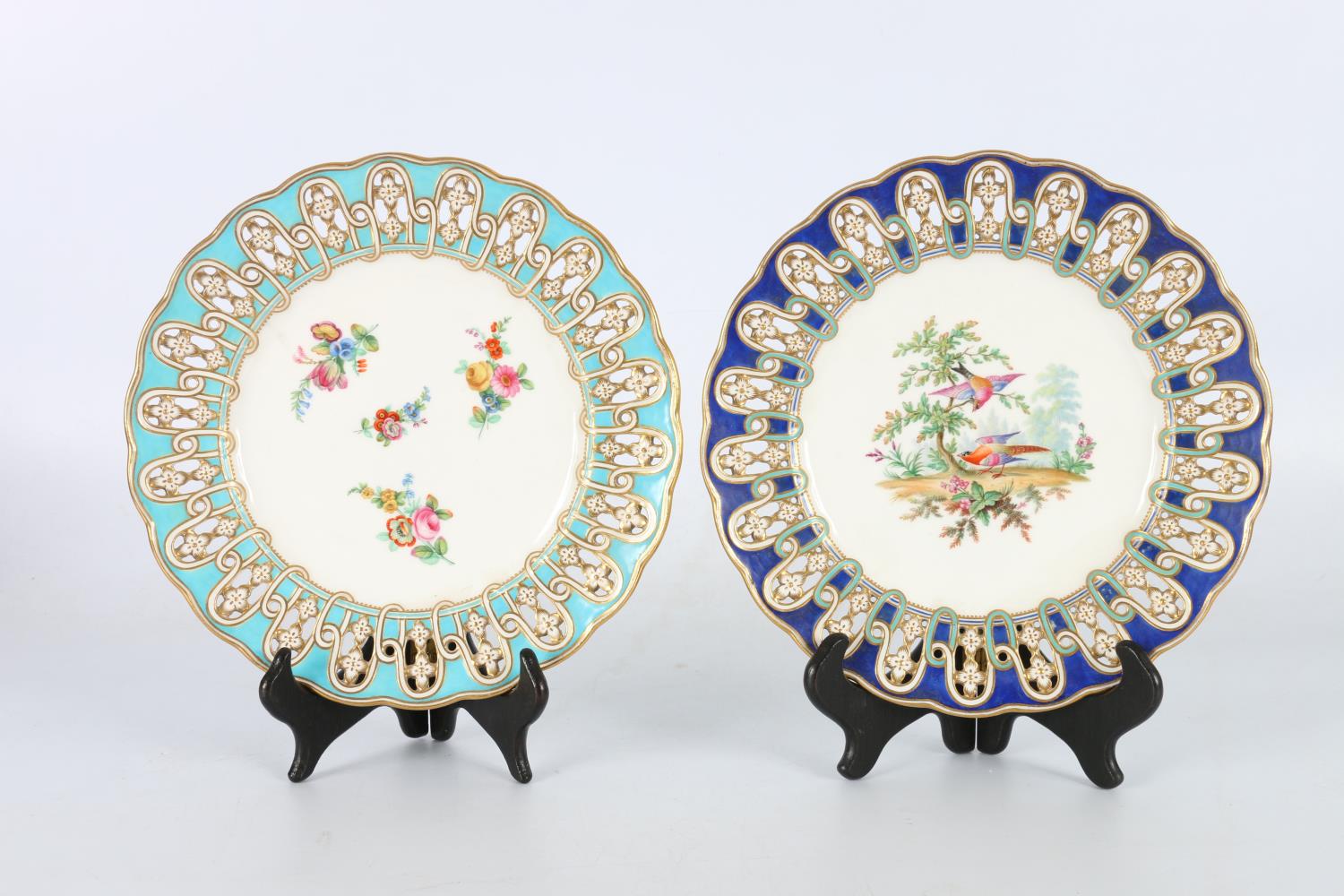 Pair of 19th century English plates, one with pierced borders on a deep blue rim, the central