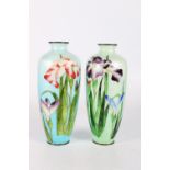 Pair of Japanese ginbari cloisonne vases, both with iris decoration on a green and blue graduated