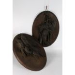 A pair of Black Forest style carved wood hunting trophy plaques with game birds on oval mount,