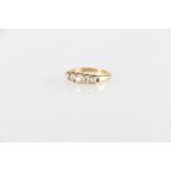 18ct gold diamond five stone ring, the central diamond approximately 0.3cts, estimated total carat