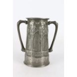 David Veasey for Liberty & Co, an Art Nouveau Tudric pewter loving cup decorated with stylised trees